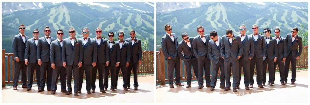 groomsmen posing on a deck in front of mountains in breckenridge